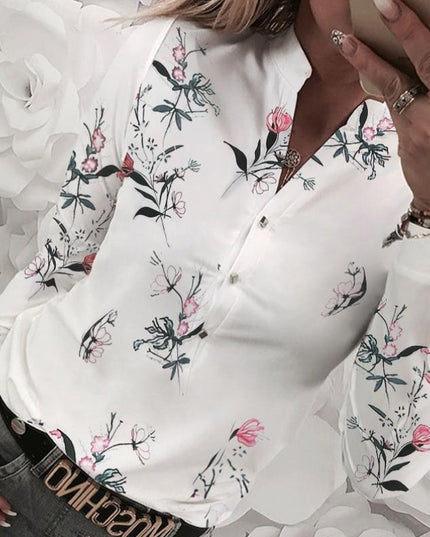 Damska koszulka z długim rękawem w kwiaty zapinana na guziki