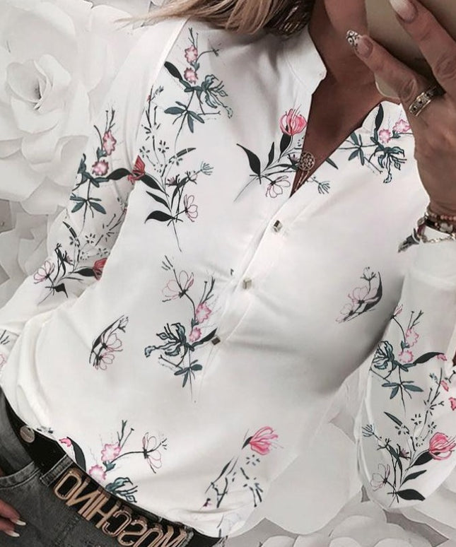 Damska koszulka z długim rękawem w kwiaty zapinana na guziki