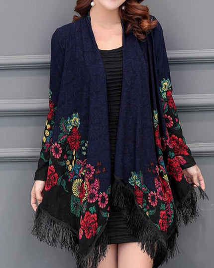Damski sweter typu ponczo z frędzlami i haftem