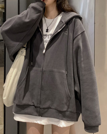 Damska bluza oversize rozpinana z kapturem i kieszeniami