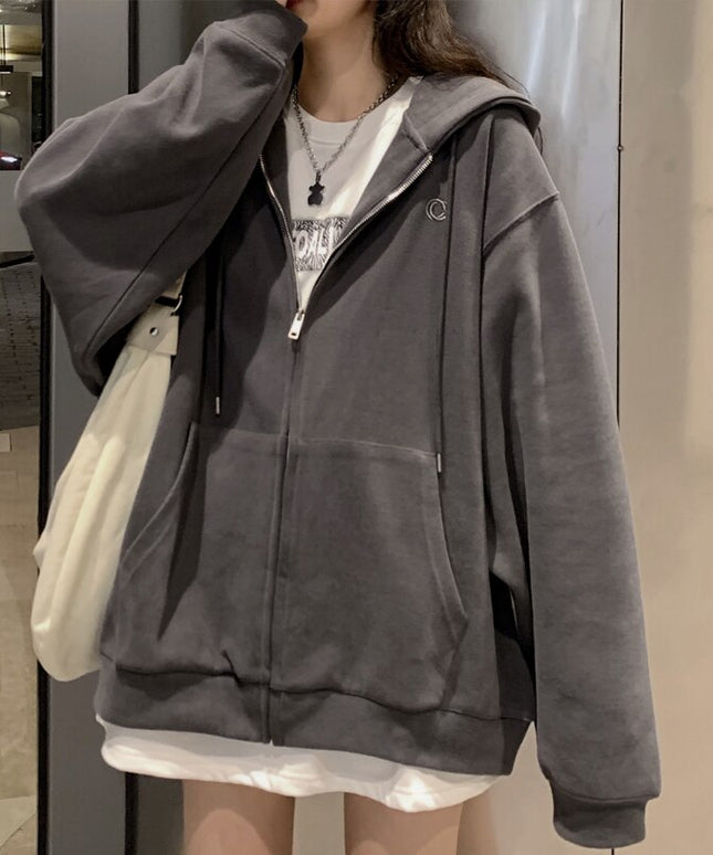 Damska bluza oversize rozpinana z kapturem i kieszeniami