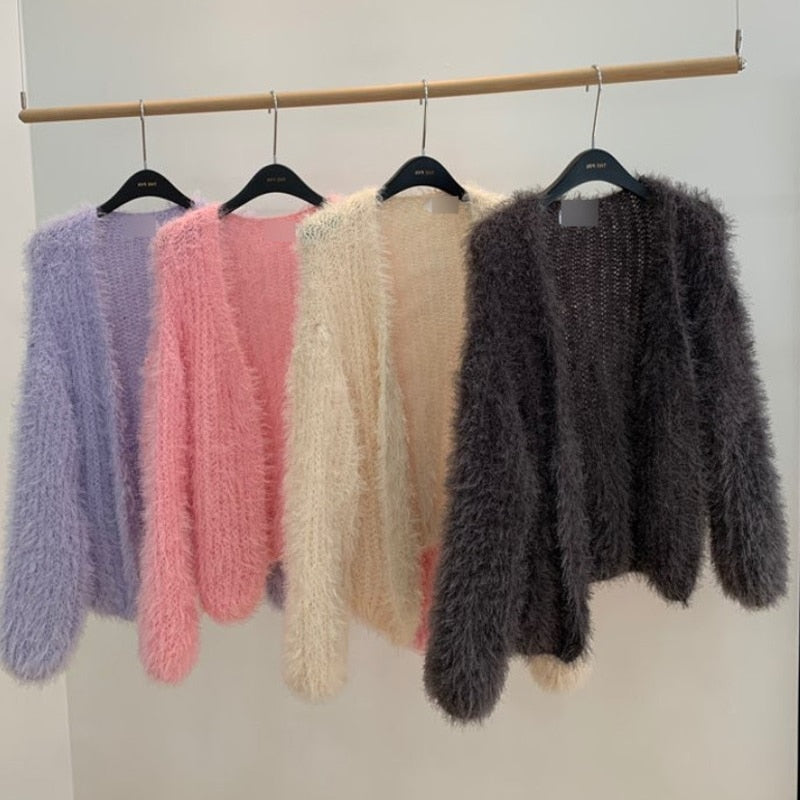 Damski sweter typu kardigan futrzany