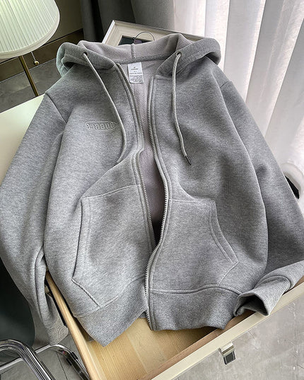 Damska bluza oversize rozpinana z kapturem