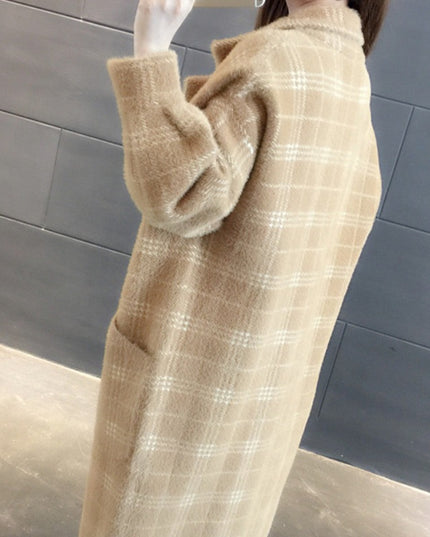 Damski płaszcz w kratę oversize z kieszeniami