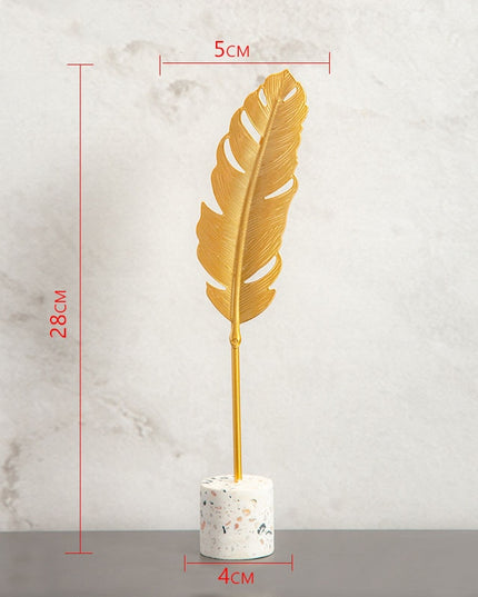 Figurka dekoracyjna liść w złotym kolorze