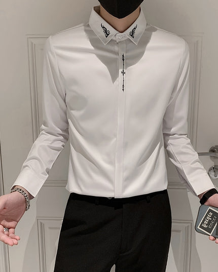 Męska koszula z drobnym haftem o prostym kroju