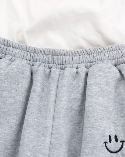 Damskie spodnie dresowe z naszywką