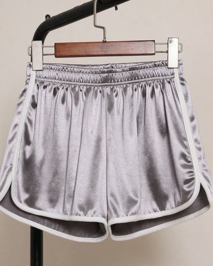 Damskie szorty sportowe z połyskującego materiału