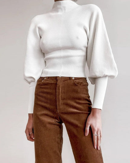 Damski sweter z golfem i bufiastymi rękawami