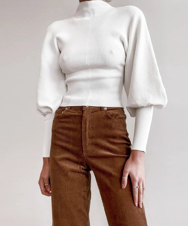 Damski sweter z golfem i bufiastymi rękawami