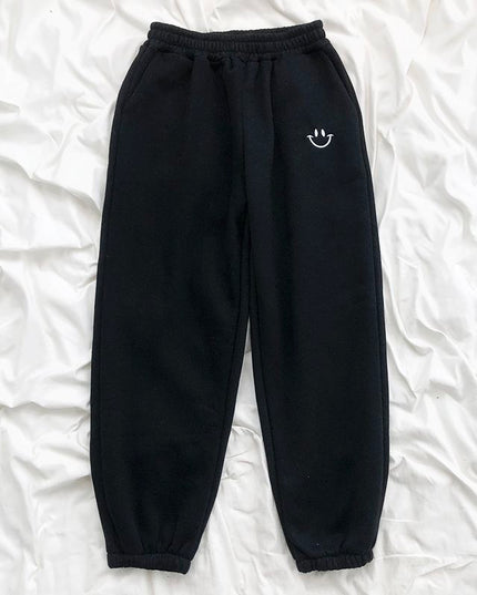 Damskie spodnie dresowe z naszywką