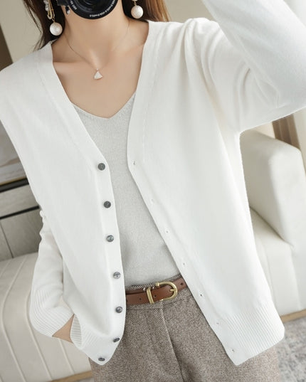 Damski sweter typu kardigan zapinany na guziki