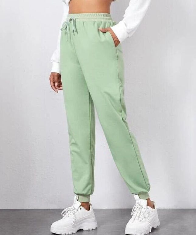 Damskie spodnie dresowe z wiązaniem i ściągaczami