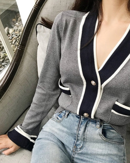 Damski sweter typu kardigan o eleganckim kroju