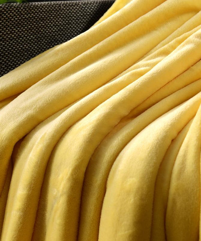 Koc flanelowy ciepły w żółtym kolorze