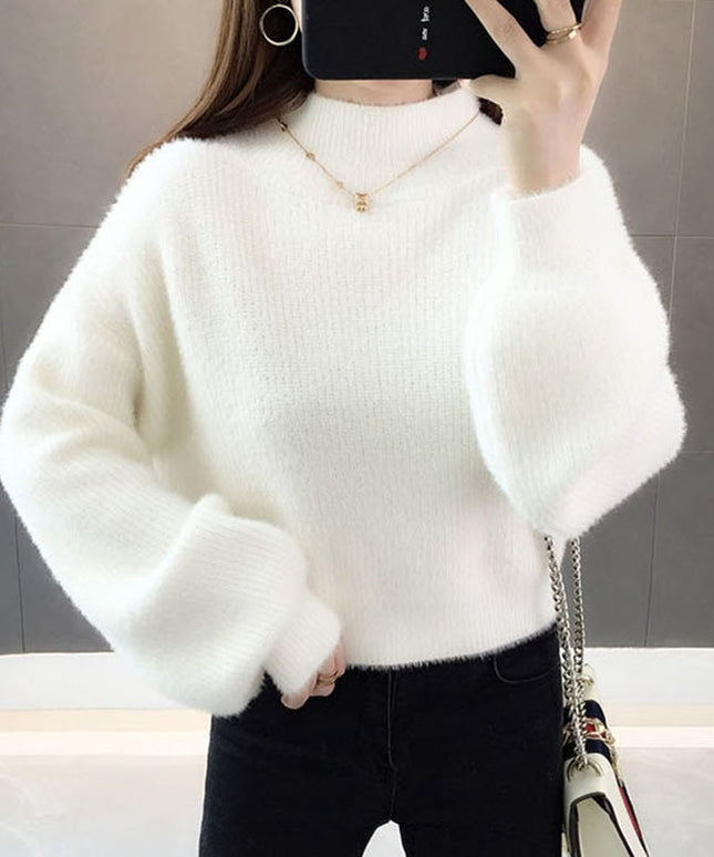 Damski sweter oversize z golfem