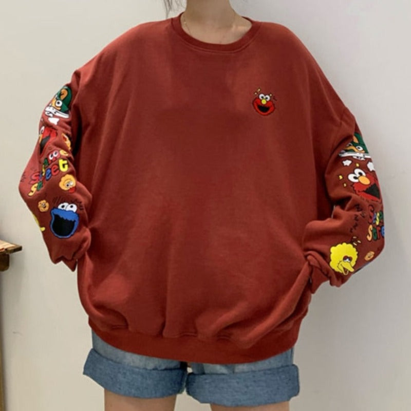 Damska bluza crewneck z nadrukami z ulicy sezamkowej