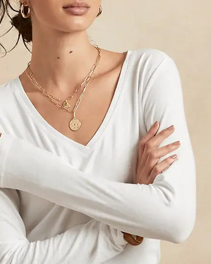 Damska koszulka z długim rękawem z dekoltem w serek