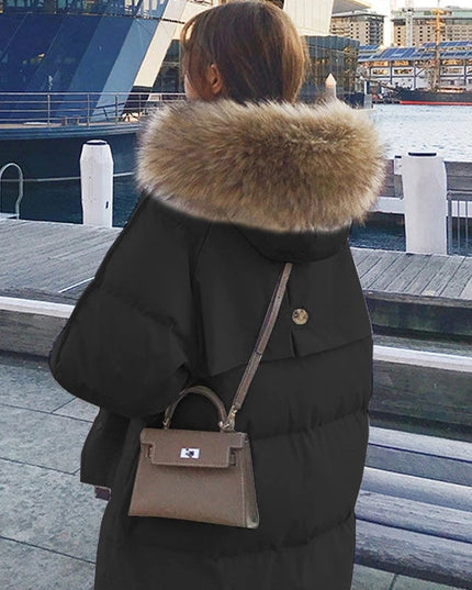 Damska kurtka zimowa ocieplana z kapturem długości przed kolano