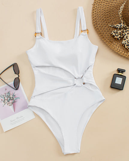 Damski jednoczęściowy strój kąpielowy z ozdobnymi wycięciami