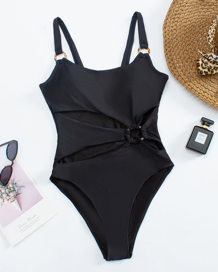 Damski jednoczęściowy strój kąpielowy z ozdobnymi wycięciami