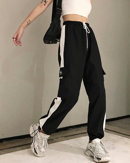 Damskie spodnie cargo z wysokim stanem i ozdobną lamówką