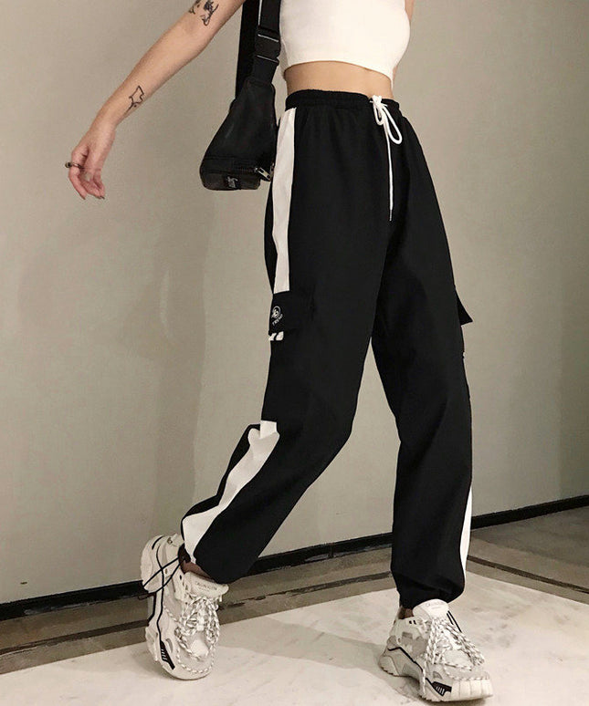 Damskie spodnie cargo z wysokim stanem i ozdobną lamówką