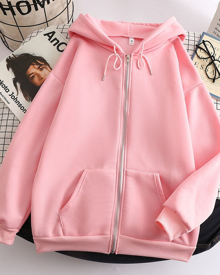 Damska bluza oversize z kapturem zapinana na suwak