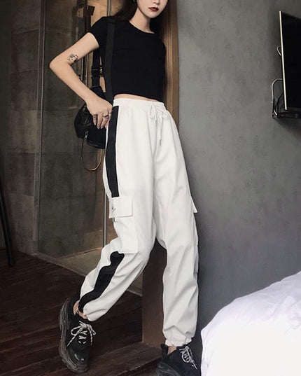 Damskie spodnie cargo z wysokim stanem i ozdobną lamówką