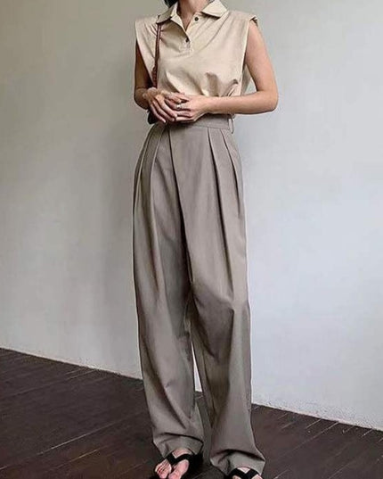 Damskie spodnie chinosy z szerokimi nogawkami i asymetrycznym zamkiem