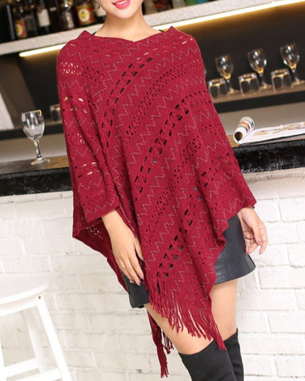 Damski sweter typu ponczo ażurowy z frędzlami