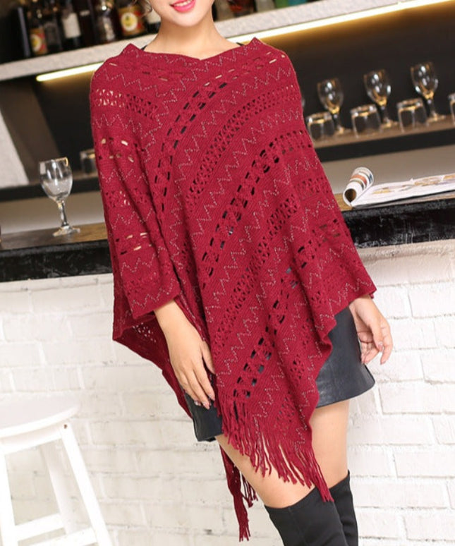 Damski sweter typu ponczo ażurowy z frędzlami