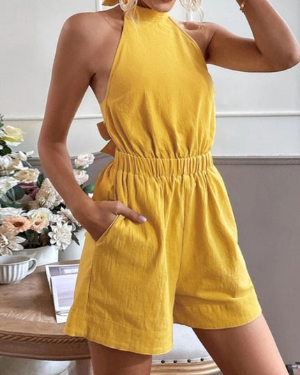 Damski kombinezon z odkrytymi plecami i wiązaniem z kokardą