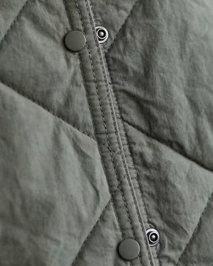 Damska kurtka przejściowa pikowana zapinana na zatrzaski