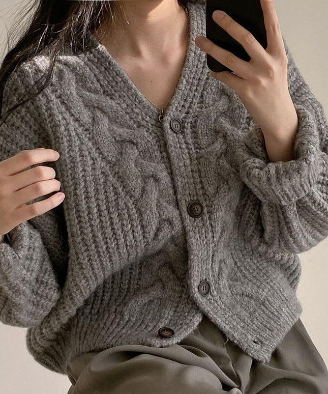 Damski sweter dziergany typu kardigan zapinany na guziki