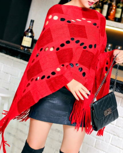Damski sweter typu ponczo wykończony frędzlami