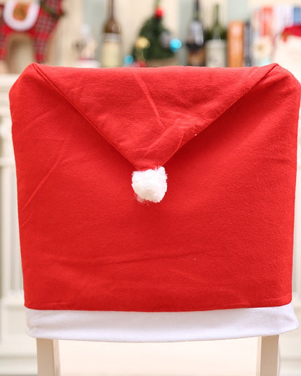 Świąteczny czerwony pokrowiec na krzesło z czapką Mikołaja