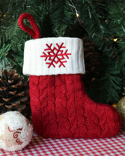 Świąteczna ozdoba wisząca w postaci skarpety z płatkiem śniegu