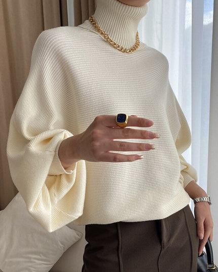 Damski sweter typu golf z bufiastymi rękawami