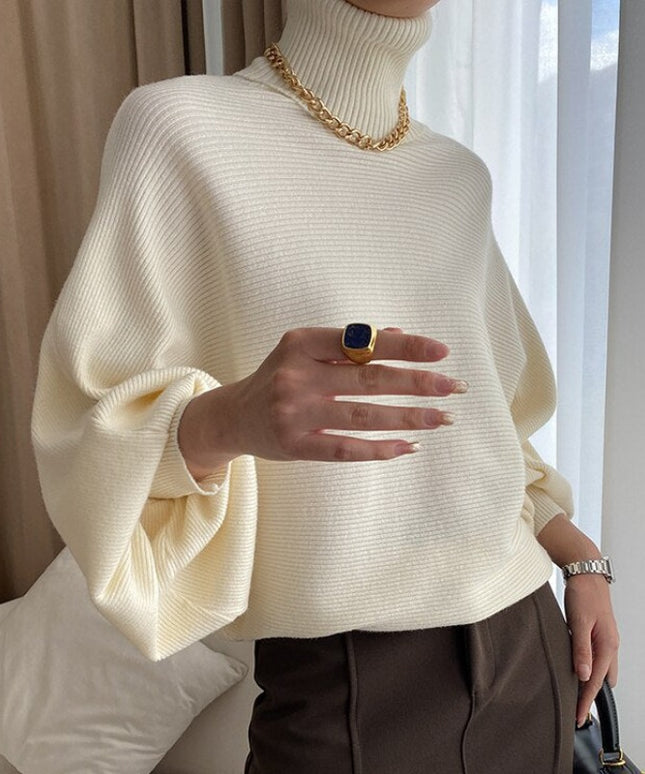 Damski sweter typu golf z bufiastymi rękawami