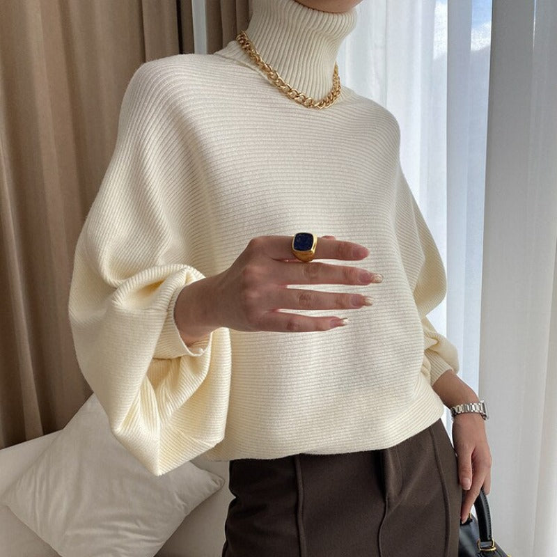 Damski sweter typu golf z bufiastymi rękawami