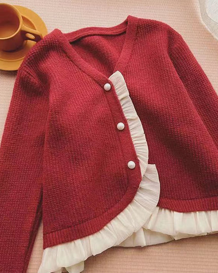 Damski sweter typu kardigan z falbanką