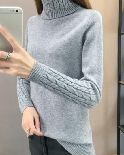 Damski sweter typu golf z plecionką