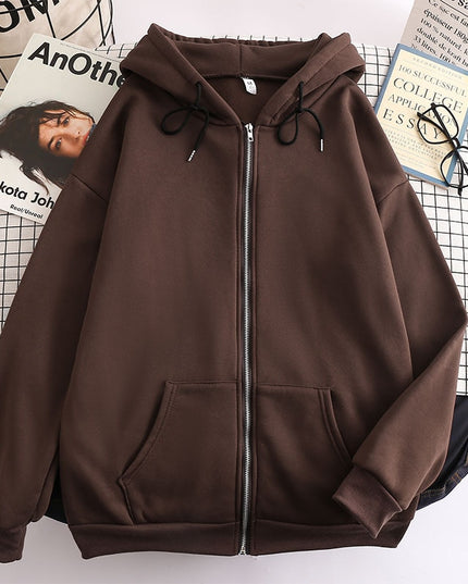 Damska bluza oversize z kapturem zapinana na suwak