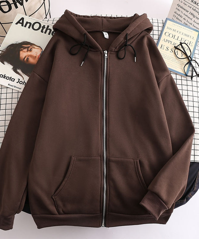 Damska bluza oversize z kapturem zapinana na suwak