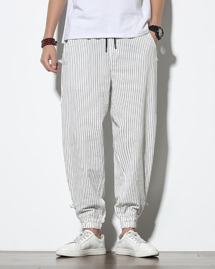 Męskie spodnie treningowe we wzór w paski