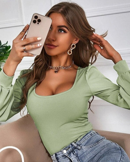 Damska koszulka z długim rękawem i bufiastymi rękawami