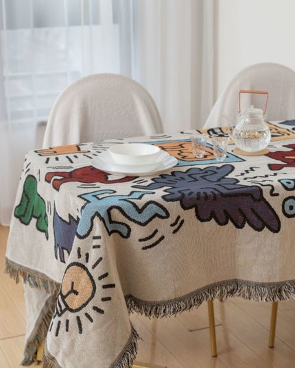 Pled z frędzlami w kolorowe rysunki