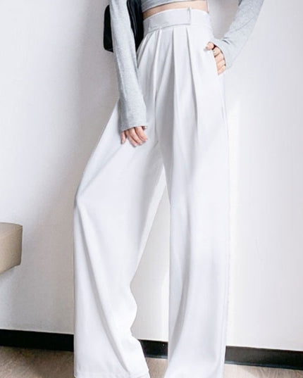 Damskie spodnie materiałowe taliowane z szerokimi nogawkami