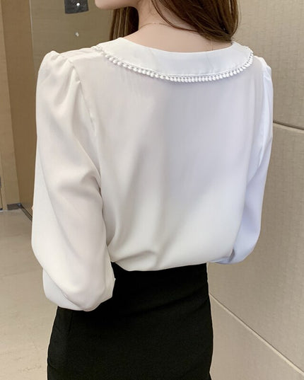 Damska koszula z ażurowymi rękawami